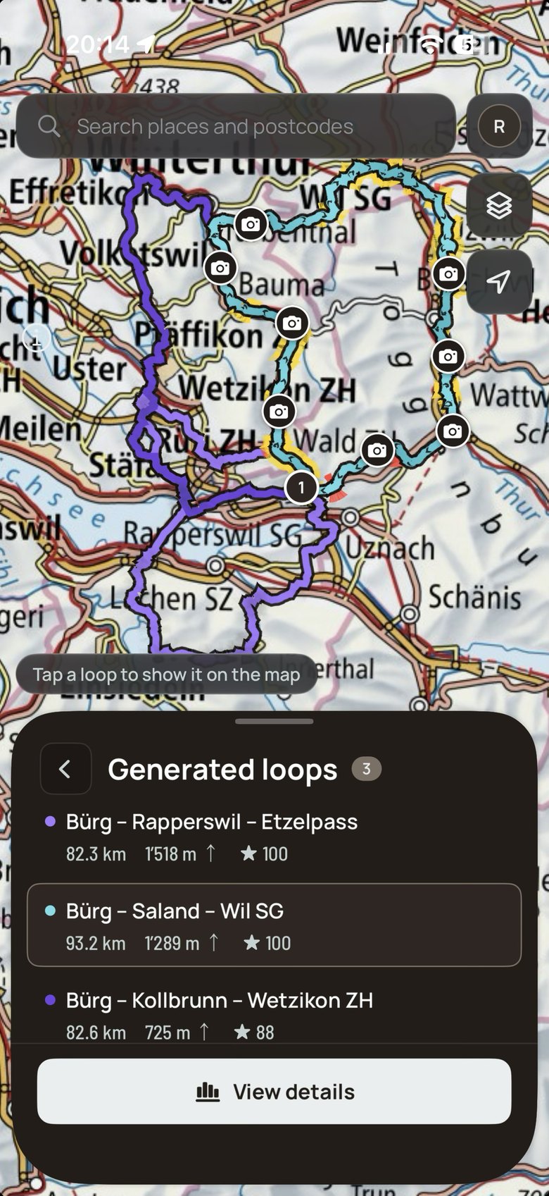 The iPhone app with three generated loops on the swisstopo map and in the list, each with its route score; Bürg – Saland – Wil SG is selected